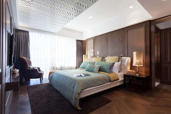 现代时尚卧室深褐色地毯室内装修效果图