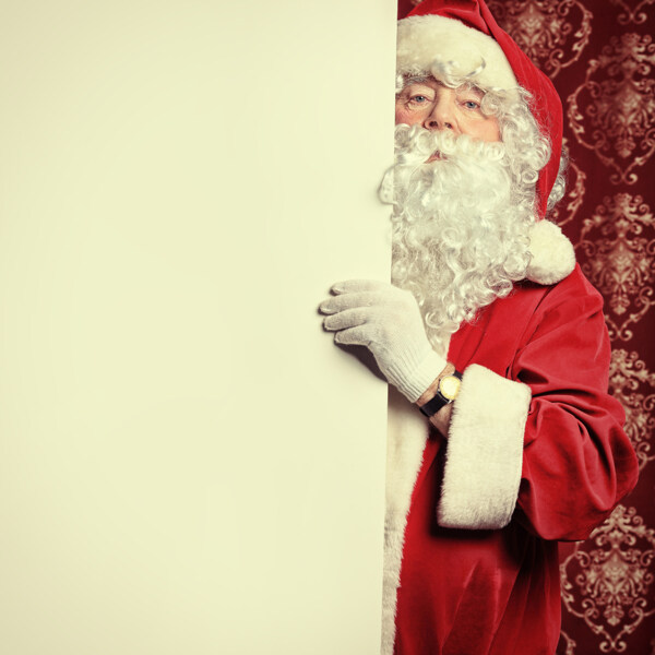拿着空白广告牌的圣诞老人图片