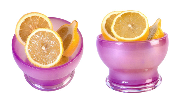 紫色碗里切开的柠檬图片