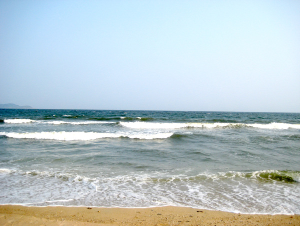 海景海浪浪花蓝天碧水海水图片