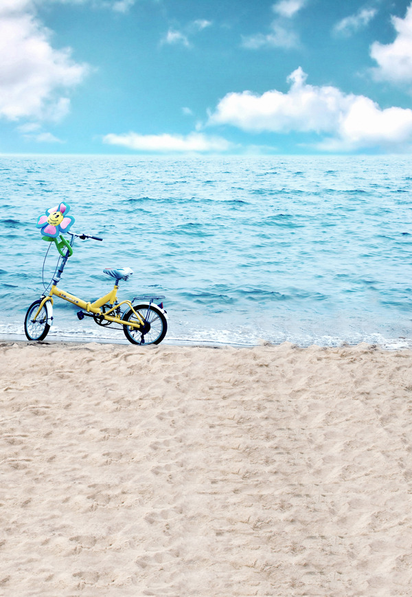 海边沙滩上的单车影楼摄影背景图片
